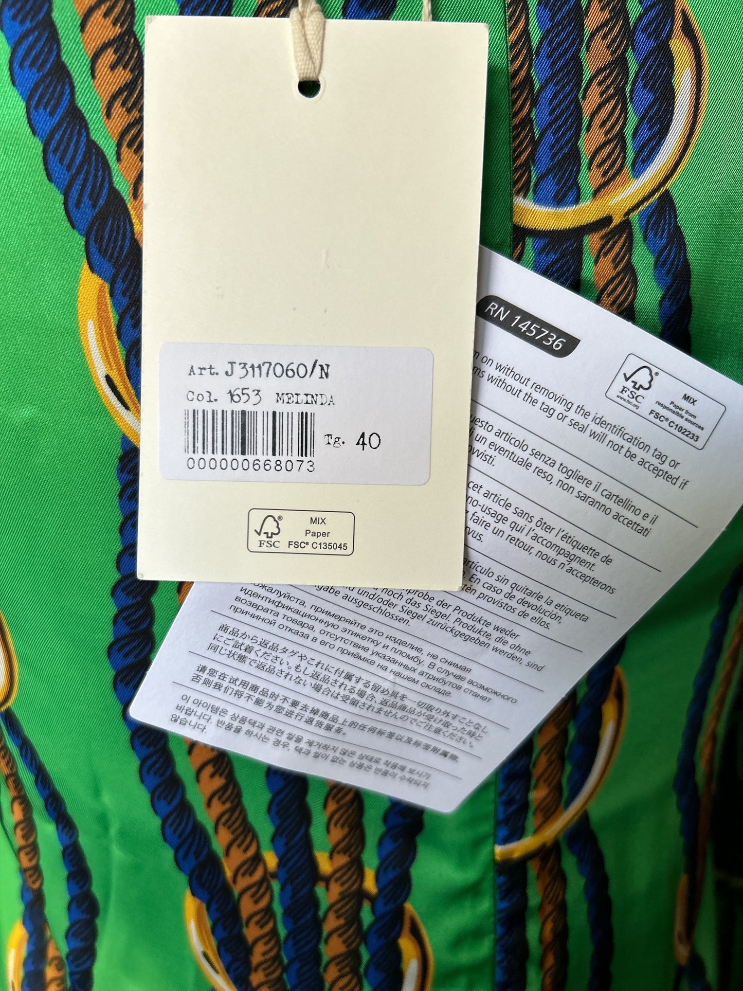 NEW WITH TAGS. JUCCA-MELINDA HAND MADE IN ITALY DRESS/SMOCK UK SIZE. SMALL, 6-8. EU34. V.NECK TWISTED NAVY & GOLD ROPE DESIGN ON LEAF GREEN SATIN MATERIAL.