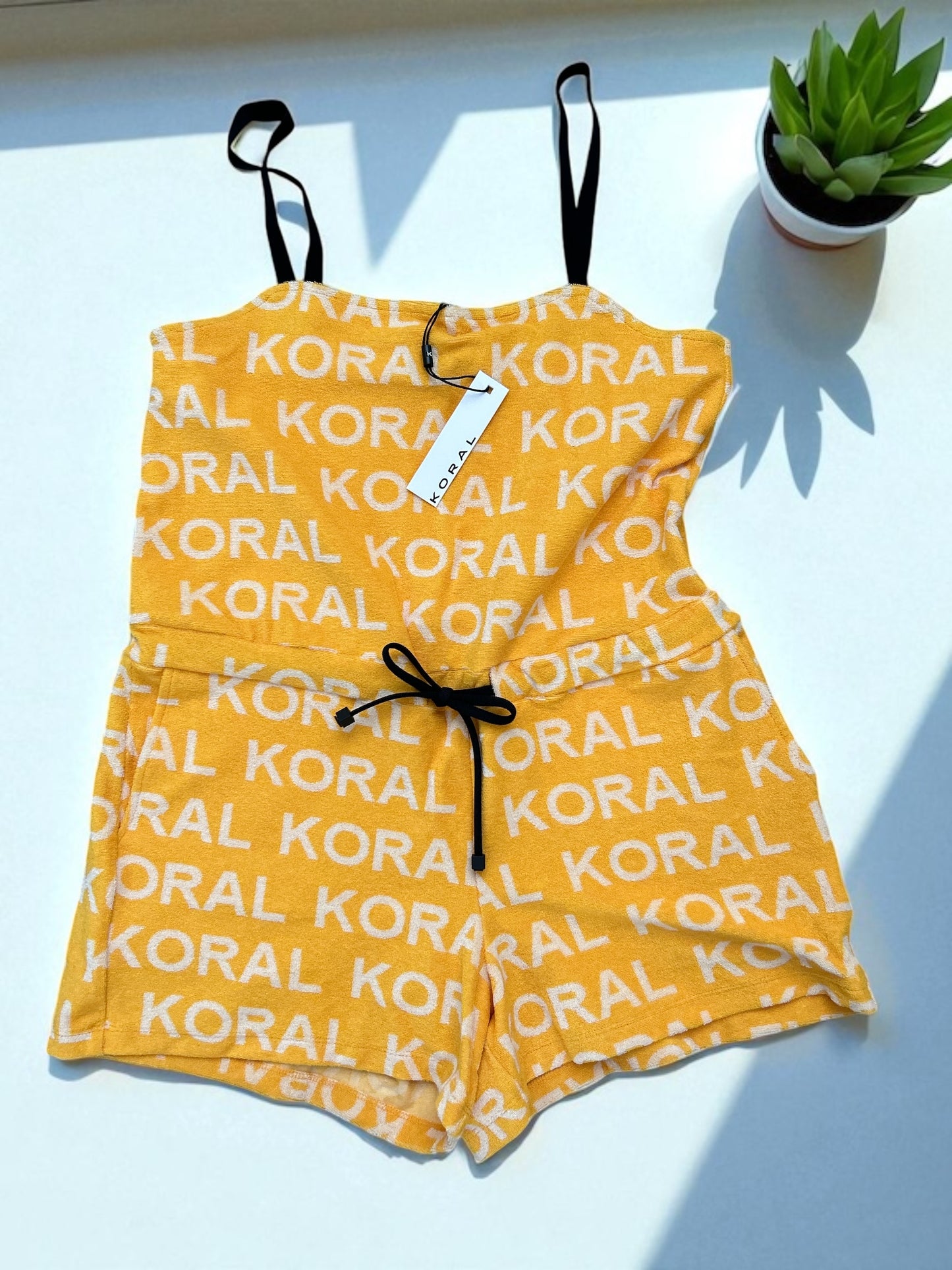 NEW WITH TAGS. KORAL TOWELLING BLACK & MANGO PLAY-SUIT UK SIZE, LARGE. X 2 HANDY POCKETS.