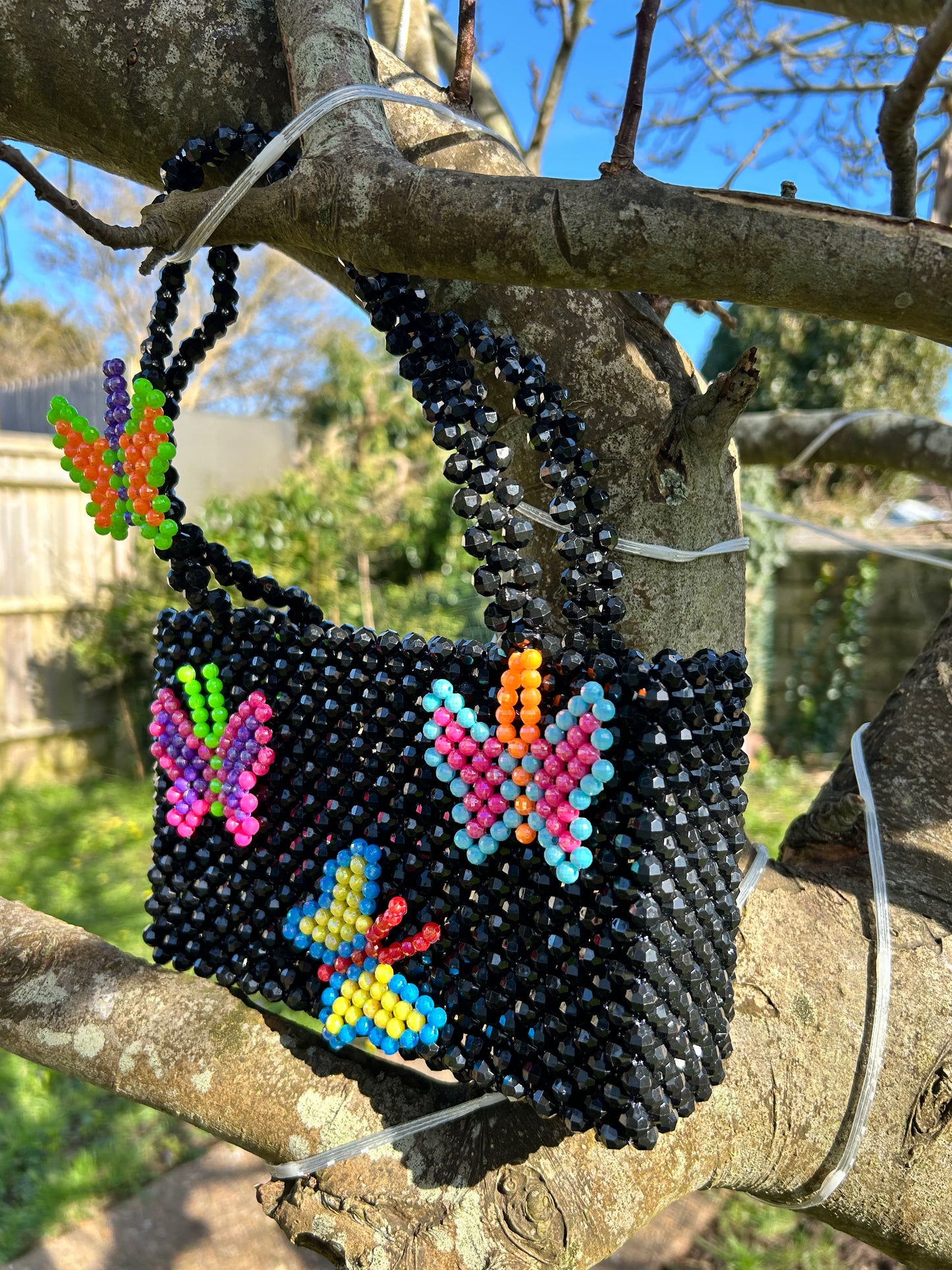 WOMANS HAND MADE DESIGNER BLACK BEADED BAG WITH BUTTERFLYS DESIGNER: SUSAN ALEXANDRA