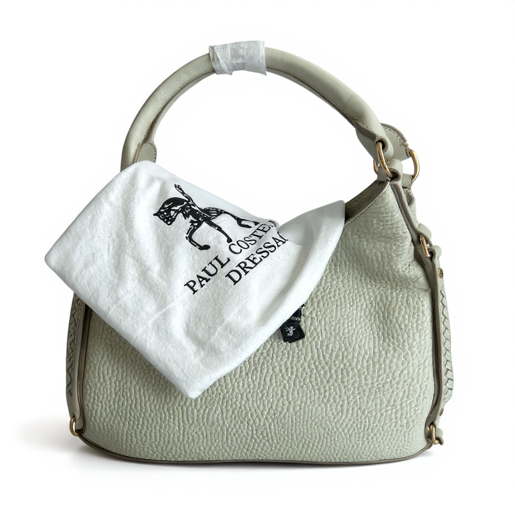 PAUL COSTELLO DRESSAGE, WAVE DETAIL, LARGE SLOUCHY HAND OR SHOULDER, CREAM LEATHER BAG WITH DETACHABLE CHARM. STUNNING LINING.