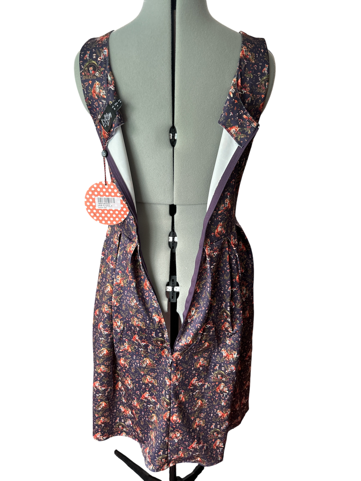 NEW AND TAGGED. Dolly & Dotty AMANDA PURPLE FOX DEN SWING DRESS, IN UK SIZE 8-10. SMALL. WITH 2 POCKETS.
